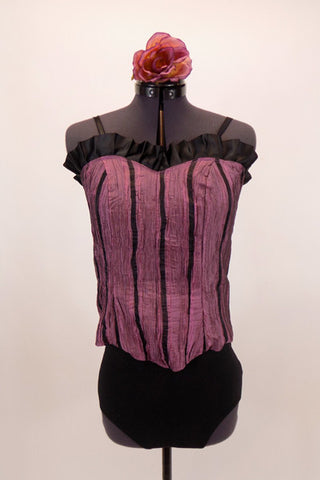 Two piece costume is mauve textured silk corset style top with black vertical ribbon inlay, satin ruffle trim & hook-eye closure. Comes with black brief bottom and floral hair accessory. Front