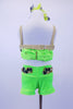 Bright green two-piece costume has gold bra with wide green band that is adorned with large jeweled green and gold appliques and gold crystals. The matching appliques extend to the shorts at both front and back. Comes with matching gold and feather hair accessory. Back