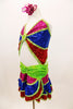 Pink, blue & red sequined dress has layered skirt, angled bust & open front torso. The bright green piping and waist is covered with hundreds of AB crystals. Comes with sequin hair accessory. Left side