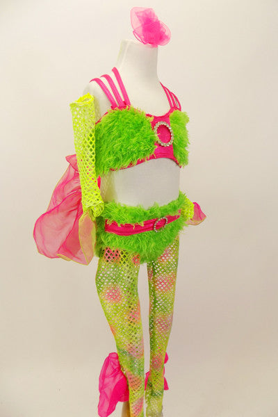 Lime green faux-fur bra and panty has hot pink criss-cross straps and belt with crystal buckle and front broach. Comes with pink/green wide mesh stockings that have pink organza fin ruffle and matching mesh finned gauntlets. The behind has a bright pink 3-D fish tale. Right side
