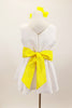 Sweet but simple white V-back dress has yellow pleated sash belt that ties at back Comes with yellow and white matching hair accessory. Back