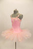 Pink platter tutu is hand tacked with zip-up bask & camisole leotard. Bodice, bask & tutu are adorned with beaded floral appliques. Comes with crystal tiara. Left side