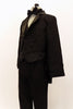 Three piece black evening tailcoat suit has  high waisted satin lapelled coat,over a black satin vest & pleated pants with satin stripe. Comes with bow tie. Left Side