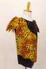 Caveman inspired cheetah print on black is a stretch fabric with jagged sleeves. Right Side