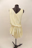 Ivory single shoulder, lined leotard  comes with, ivory satin toga style cover that has peplum, corded tassel belt & crystal accent broach. Has hair accessory. Back