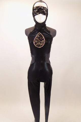 Black full unitard has halter collar with open sides and back. There is a lined lace front insert with crystal details. The costume has an attached hood with lace strip that covers the eyes. Front with hood