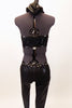Black full unitard has halter collar with open sides and back. There is a lined lace front insert with crystal details. The costume has an attached hood with lace strip that covers the eyes. Back