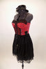 Red and black bustier dress has crystaled lace edging on skirt. Bustier has lace torso & bust. & hundreds of  Swarovski crystals. Comes veiled top-hat accessory. Left side