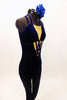 Electric blue velvet full unitard has nude triangle inserts on torso & criss-cross decoration. The low open-back has cross straps. Has matching hair accessory. Right side