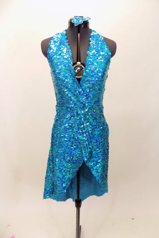 Bright aqua, fully sequined halter dress, has cross-over bodice as well as cross-over skirt with peek-a-boo front.  Comes with applique hair accessory.  Front