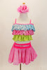 Pastel costume has tri-colored top in layered ruffles of glittery blue pink and green. The skirt is glittery pink with bright pink waistband and decorative pink crystal buckled belt. Comes with pastel pink floral hair accessory. Front