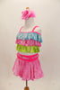 Pastel costume has tri-colored top in layered ruffles of glittery blue pink and green. The skirt is glittery pink with bright pink waistband and decorative pink crystal buckled belt. Comes with pastel pink floral hair accessory. Side