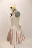 Ivory lace leotard has blush satin Peter Pan collar with black ribbon tie. Matching satin skirt has ivory tulle & satin bow. Comes with ivory hair accessory. Left side