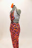 Unitard is two piece orange & pink leopard print joined by large black zipper at front. Halter top has with sequined sides. Has striped belt & hair accessory. Left side