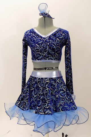 Long sleeved half top & skirt with curly ruffle and petticoat, are a navy blue velvet base with aqua & silver swirl patterns. Costume has matching head piece. Front
