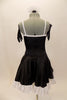 Black sateen French maid dress has princess seams with white center on bodice and attached white apron. The edge of the skirt, apron and bust has wide French lace trim. Comes with ruffled hair accessory & black gloves. Back