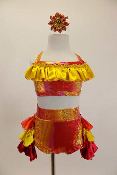 Iridescent yellow, red & orange costume has halter style top with yellow satin ruffle & shorts with layered bustle of red, yellow & orange satin ruffles. Comes with sequined hair accessory. Front