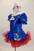 Blue pouf sleeve leotard has silver naval collar & red star.s Has matching skirt with anchor motif, silver bow,ruffled red petticoat, gloves, socks & hair bows. Left side