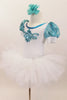 White velvet leotard has turquoise lace sleeves. Neckline has turquoise sequins & large jeweled applique. Comes with white tutu skirt & floral hair accessory. Left side
