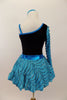 Black velvet leotard has single sleeve of soft, layered turquoise ruffles. Comes with matching turquoise ruffled skirt with petticoat and floral hair accessory. Back