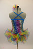 Rainbow colored square-sequined camisole leotard has attached rainbow colored, curly organza ruffle skirt. Comes with matching rainbow hair accessory. Back