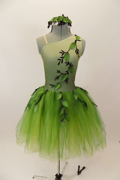 Forest themed green romantic tutu dress has single shoulder with ribbon branches & 3-D leaves.Tutu is layers of soft green fading tulle. Has leaf hair accessory. Front