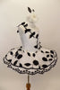 White pancake tutu has cascading black 3-D leaves on a vine of black ribbon. Overlay has black flowers & scalloped floral lace trim. Has matching hair accessory. Right side