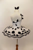 White pancake tutu has cascading black 3-D leaves on a vine of black ribbon. Overlay has black flowers & scalloped floral lace trim. Has matching hair accessory. Back
