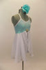 Aqua sequined leotard dress has cross back straps. Attached open-front white chiffon skirt has crystal rose brooch accent. Comes with aqua floral hair piece. Right side