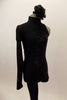 Black high neck unitard has one long leg and one sleeve & open back. There is a swirling pattern of black sequin along  left side. Has black hair accessory. Right side