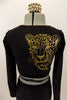 Long sleeved black crop top has large gold leopard/tiger with Swarovski eyes on right back shoulder. Accompanied by matching black leggings. Has gold hair piece. Back zoomed