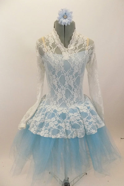 Pale blue leotard with romantic tutu of layered pale blue tulle, sits below a long sleeved ivory  V-neck lace dress with peplum. Comes with matching hair piece. Front