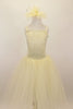 Ivory romantic tutu dress has layers of long soft tulle & lace bodice.There is a large bow at the  mid lower back. Comes with large, ivory veiled hair accessory. Front