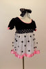 Dress has black velvet bodice with pouf sleeves, pink satin trim & bows. Skirt is white mesh with black dots & pink satin trim. Has dotted waist sash & hair bow. Right side