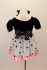 Dress has black velvet bodice with pouf sleeves, pink satin trim & bows. Skirt is white mesh with black dots & pink satin trim. Has dotted waist sash & hair bow. Back