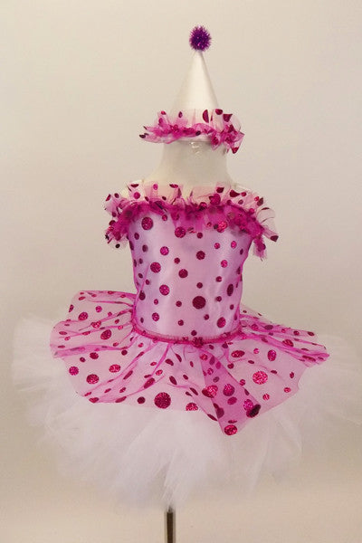 White satin leotard has fuchsia polk-a-dot overlay with bodice ruffle and attached skirt which sits on top of white tutu. Has matching satin ruffled clown hat. Front