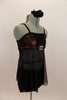 Costume has black camisole top with ruched bust area,bronze metallic sides & sheer torso. Has silver buckle accent. Comes with black shorts and hair accessory.Right side