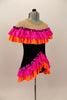 Black tunic style leotard dress has nude drop shoulder with orange & hot pink ruffles. The bottom has matching ruffled edge that comes up in the front. Comes with hair accessory. Side