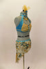 Belly dance style costume has turquoise & gold halter bra with choker collar. Ivory sarong skirt has beaded appliques & attached coins. Had gold hair accessory. Right side