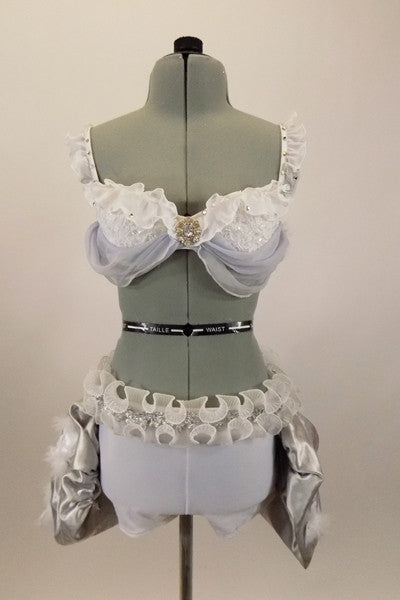 Costume has white bra (36A) with chiffon ruffle,beaded lace & grey draping. Bottom is white short & silver silk pouf bustle, white organza roses, feathers & curly ruffle. Has matching hair accessory. Front