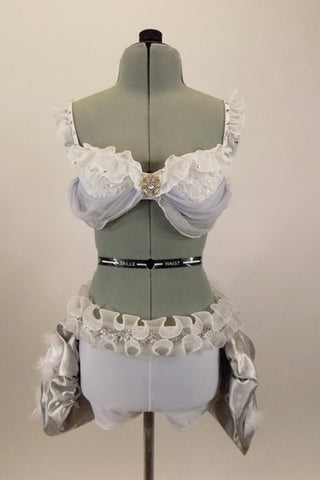 Costume has white bra (36A) with chiffon ruffle,beaded lace & grey draping. Bottom is white short & silver silk pouf bustle, white organza roses, feathers & curly ruffle. Has matching hair accessory. Front