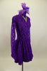 Purple lace high neck, long sleeved open back dress has large jeweled crystal attached necklace. Comes with large matching purple hair accessory. Right side