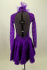 Purple lace high neck, long sleeved open back dress has large jeweled crystal attached necklace. Comes with large matching purple hair accessory. Back