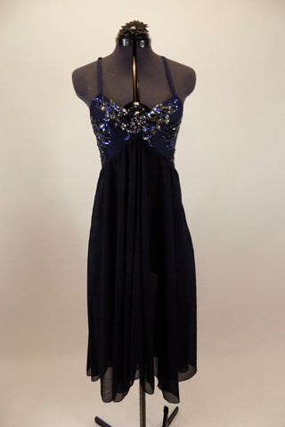 Navy blue chiffon empire waist dress has sequined/beaded lace bust with large center brooch. Low back has thin cross straps. Comes with matching hair accessory. Front