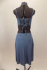 Blue-grey costume has camisole top with corset back & attached high neck collar with large jeweled necklace. Has matching long skirt with side slits & hair clip. Back