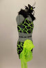 Neon green & black animal print costume has half top with black fur collar. Matching shorts have large lime green organza bow on right hip with crystal accents. Right side