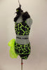 Neon green & black animal print costume has half top with black fur collar. Matching shorts have large lime green organza bow on right hip with crystal accents. Left side