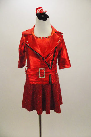 Red metallic motorcycle jacket has asymmetrical zipper,crystaled belt loops and buckle. Comes with separate bra top, sequin skirt, hair accessory & gauntlets. Front