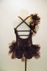 Camisole biketard is brown sequin with brown ribbon-rose trim & gold leaves, flowing from the hip over shoulder. Open back,crystaled straps & open tutu bustle. Comes with matching hair accessory. Back