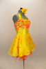 Orange & yellow paillettes, feathers & crystals adorn yellow satin dress with halter neck, skirt with yellow base on orange petticoat & matching hair accessory. Right side